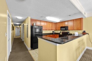 Condo, 2 Bedrooms | Private kitchen | Fridge, oven, coffee/tea maker, toaster
