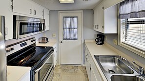 Condo, 2 Bedrooms | Private kitchen | Fridge, oven, coffee/tea maker, toaster