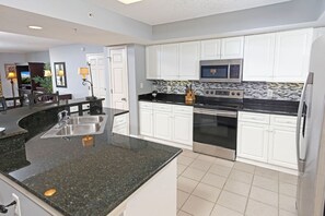Condo, 4 Bedrooms | Private kitchen | Fridge, oven, coffee/tea maker, toaster
