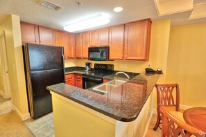 Condo, 1 Bedroom | Private kitchen | Fridge, oven, coffee/tea maker, toaster