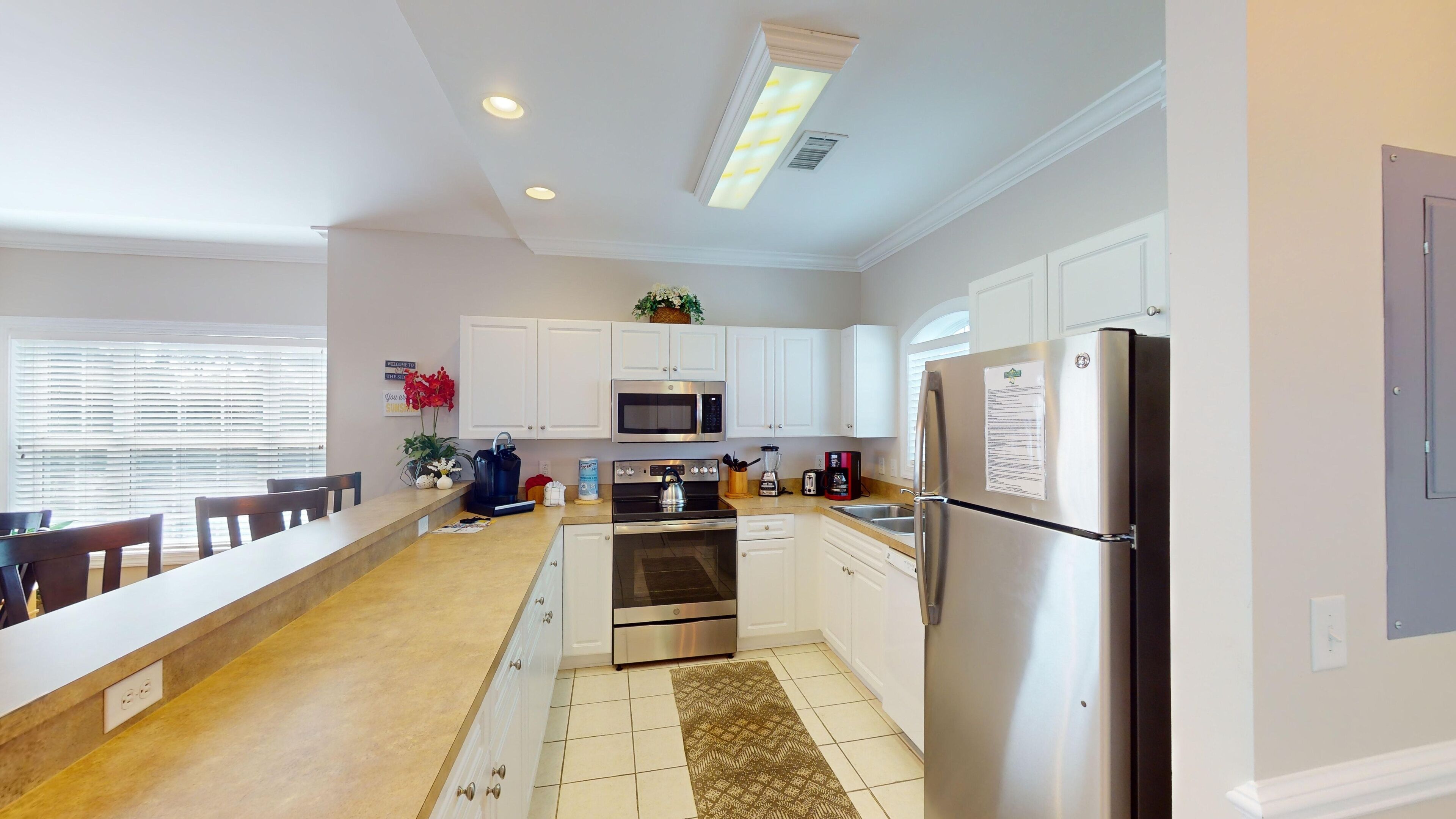 Condo, 2 Bedrooms | Private kitchen | Fridge, oven, coffee/tea maker, toaster