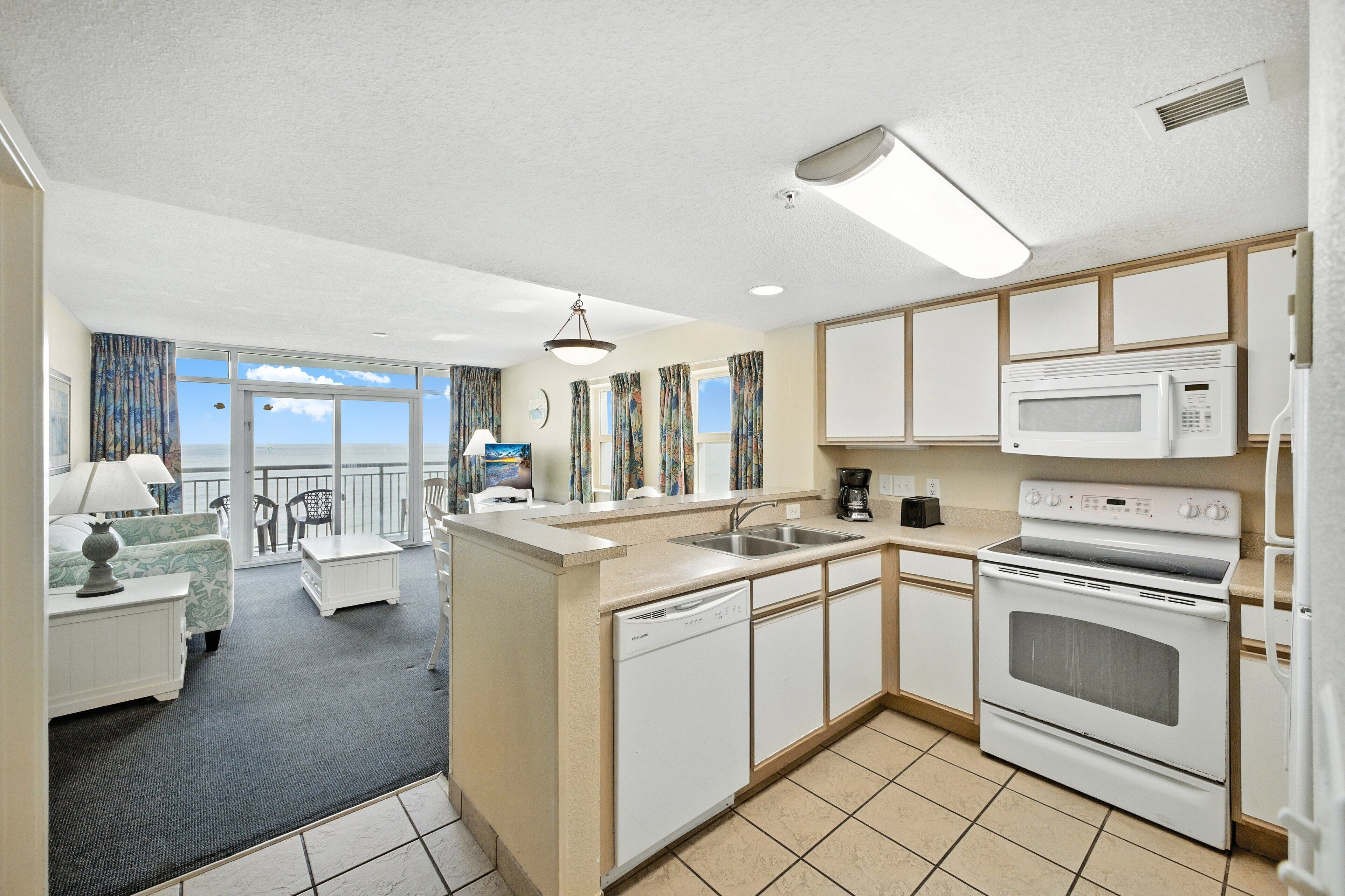 Condo, 2 Bedrooms | Private kitchen | Fridge, oven, coffee/tea maker, toaster