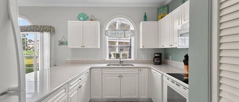 Condo, 2 Bedrooms | Private kitchen | Fridge, oven, coffee/tea maker, toaster