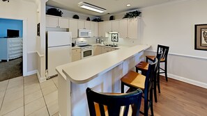 Condo, 3 Bedrooms | Private kitchen | Fridge, oven, coffee/tea maker, toaster