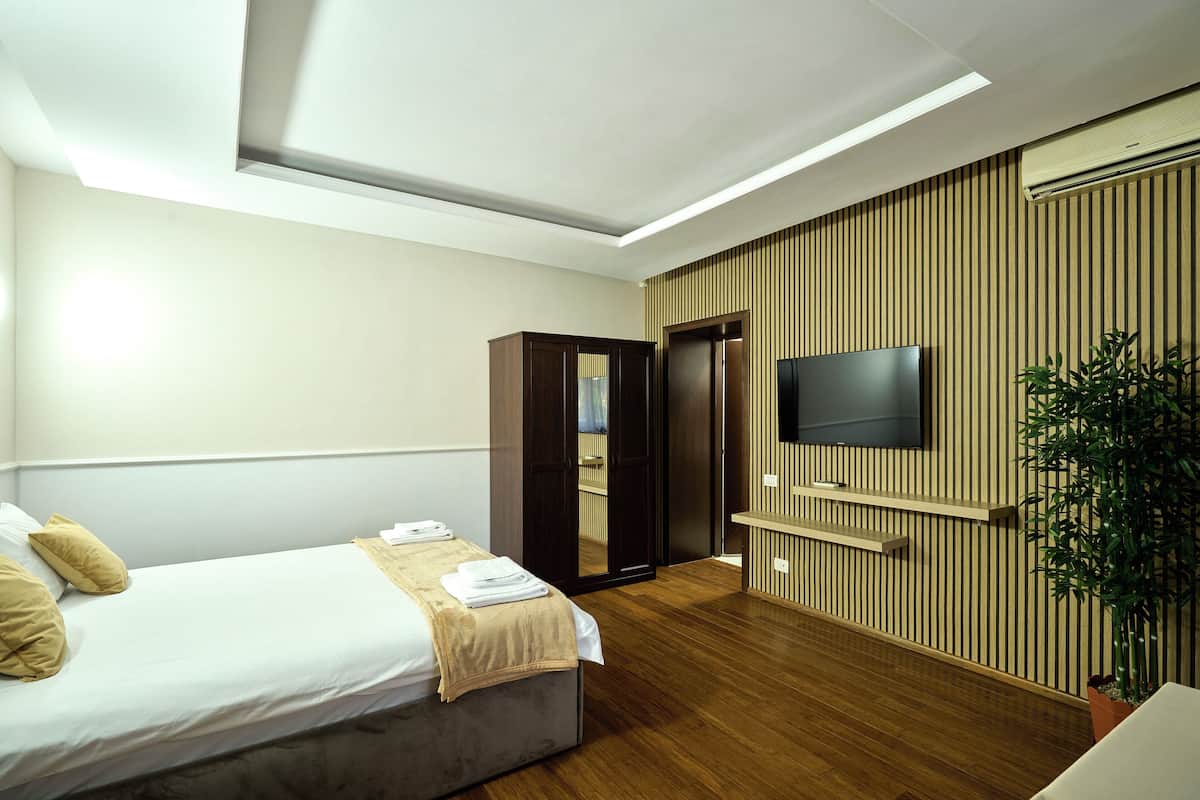 Habitación doble Deluxe | Tabla de planchar con plancha y wifi gratis