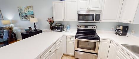 Condo, 2 Bedrooms | Private kitchen | Fridge, oven, coffee/tea maker, toaster