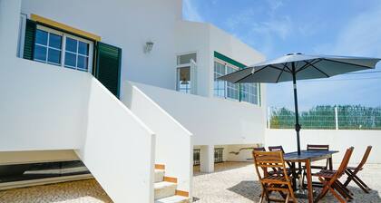 Serene Duplex House With Patio by LovelyStay