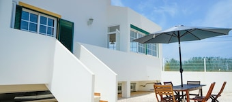 Serene Duplex House With Patio by LovelyStay