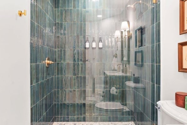 Shower, hair dryer, towels, soap