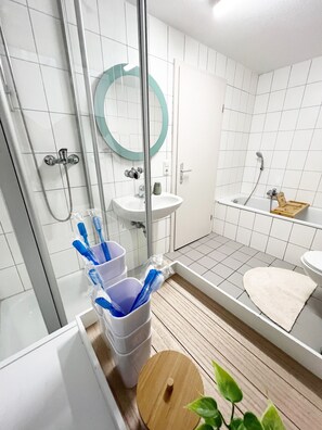 Hair dryer, towels, soap, toilet paper