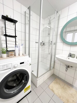 Hair dryer, towels, soap, toilet paper
