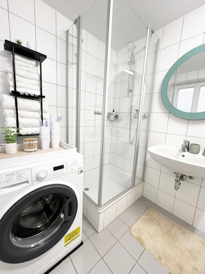 Hair dryer, towels, soap, toilet paper