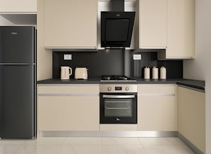 Appartamento | Cucina privata | Frigorifero, microonde, forno, piano cottura