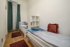 2 habitaciones, tabla de planchar con plancha y acceso a internet 