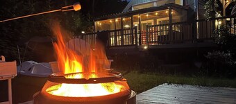 Chic lakefront retreat with year-round charm. Enjoy Lake Barnabee views, a fully stocked kitchen, and cozy vibes in a nostalgic lake community. Kayak in summer, skate in winter, and take advantage of fun in-home concierge services.