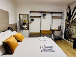 Apartment, Patio, Ground Floor | Blackout curtains, soundproofing, iron/ironing board, free WiFi