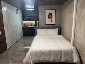 1 habitación, tabla de planchar con plancha, wifi y ropa de cama 