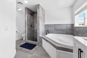 Shower, jetted bath, hair dryer, towels