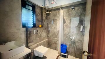 Shower, free toiletries, hair dryer, slippers