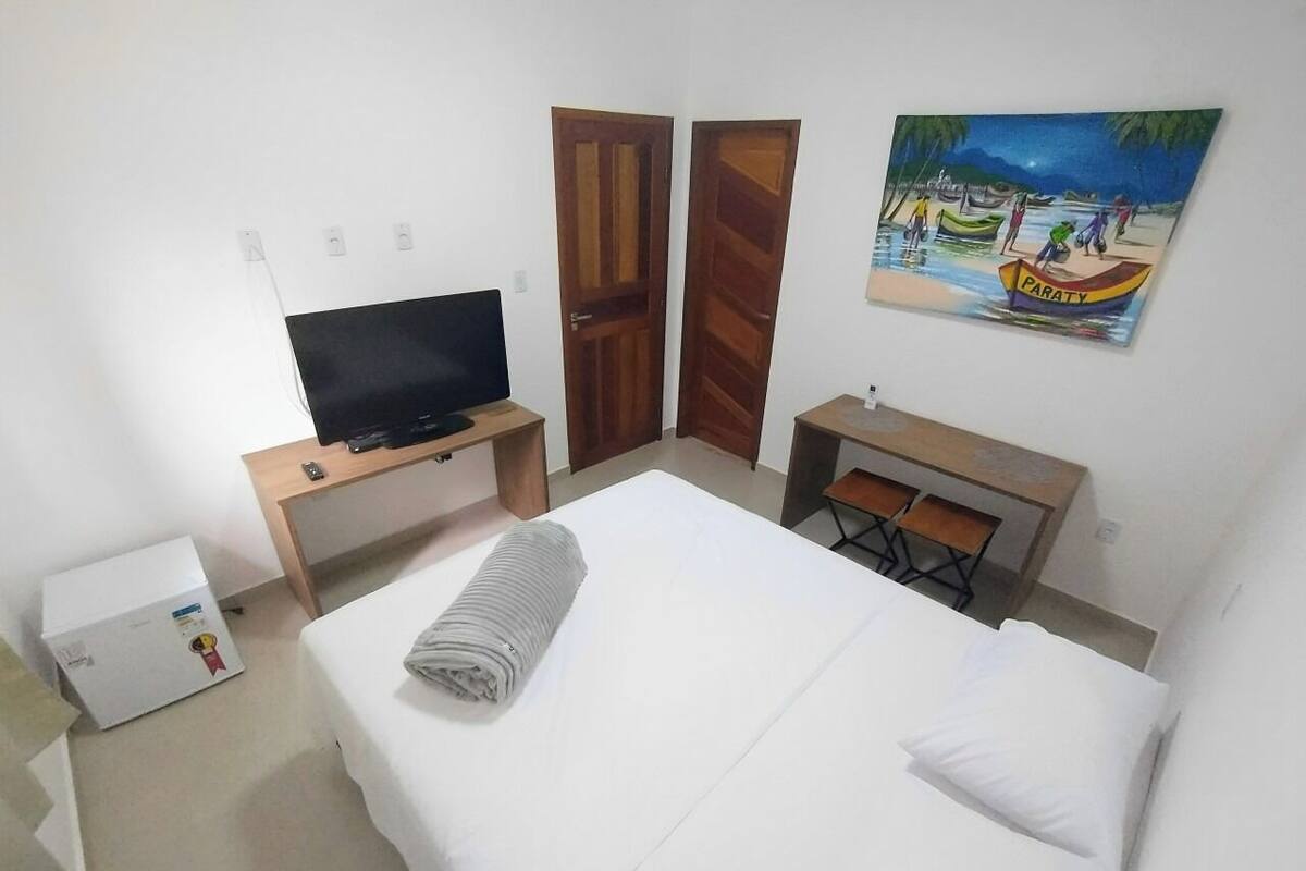 Premium bedding, pillowtop beds, desk, laptop workspace
