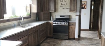 "Farmhouse on the Edge" a spacious farmhouse centrally located near AdamsvilleOH