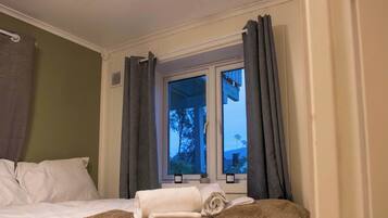 2 bedrooms, travel crib, WiFi, bed sheets