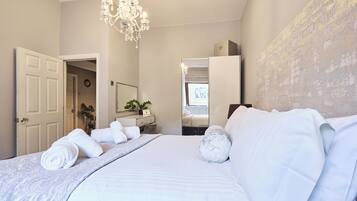 3 bedrooms, desk, iron/ironing board, travel cot