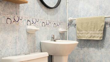 Shower, towels, soap, toilet paper