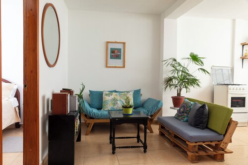 Baños Downtown Comfy  apartment - work area & laundry