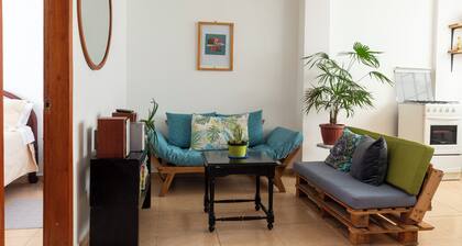 Baños Downtown Comfy apartment - work area & laundry