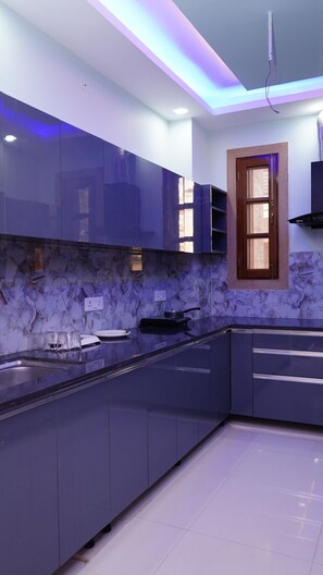 Fridge, microwave, cookware/dishes/utensils