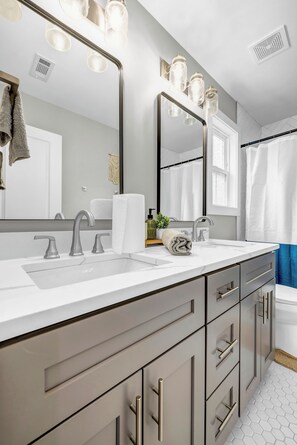 Hair dryer, towels, soap, toilet paper