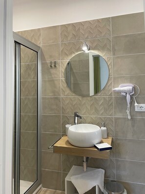 Hair dryer, towels, soap, toilet paper