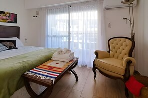 Fer et planche à repasser, draps fournis