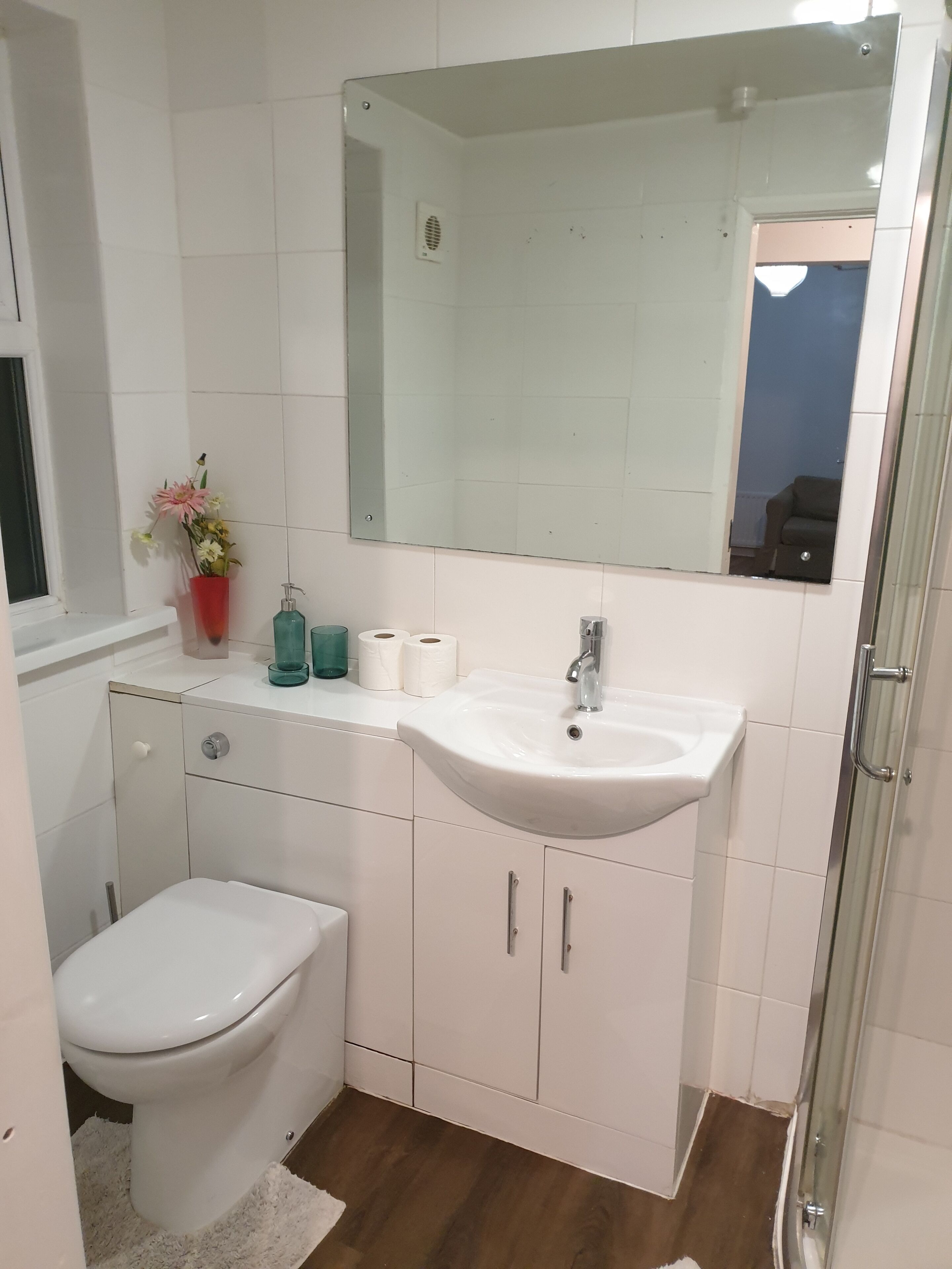 Shower, hair dryer, towels, soap