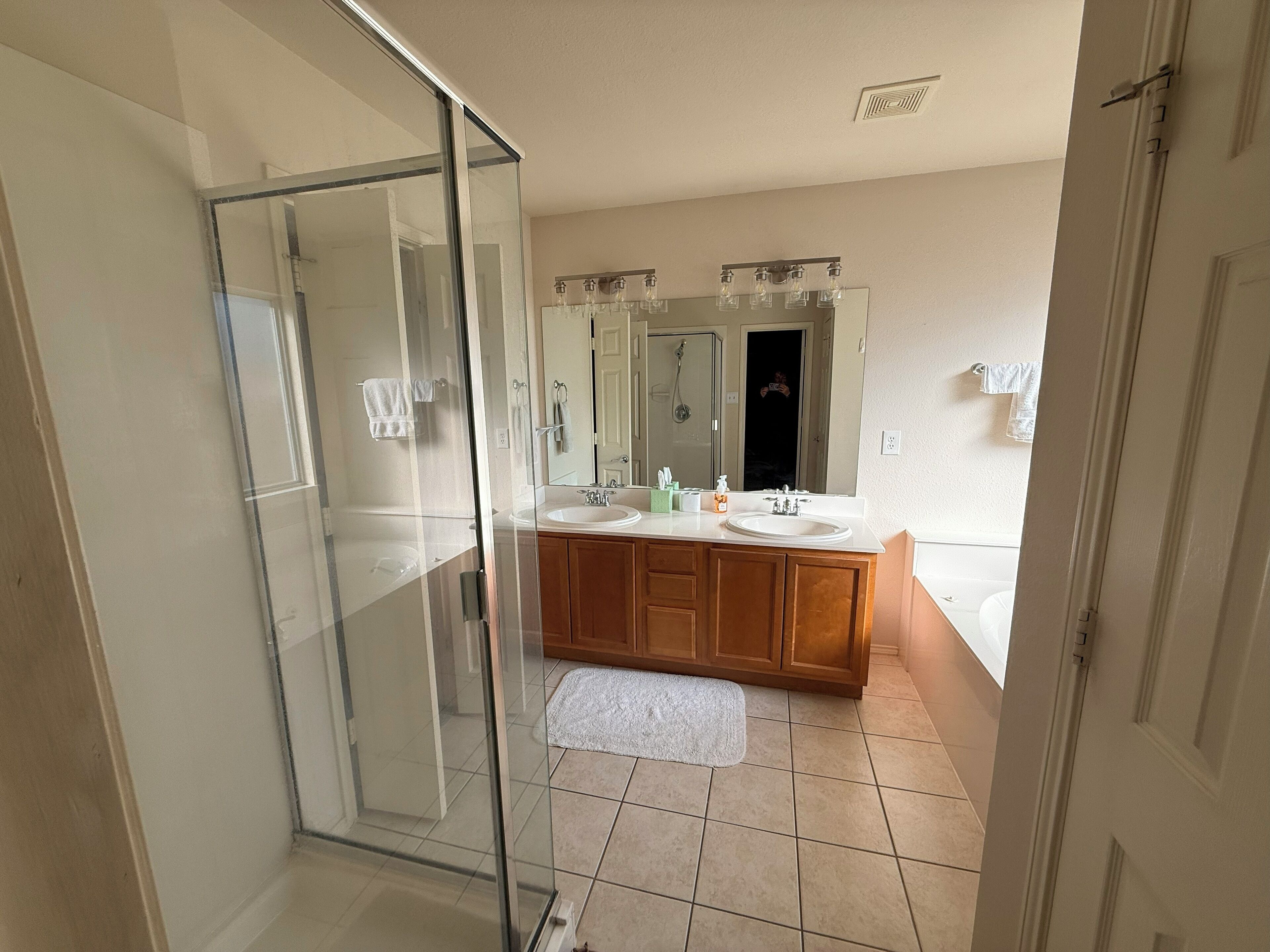 Jetted tub, hair dryer, towels, toilet paper