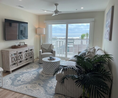 BRAND NEW OCEANFRONT LUXURY CONDO! Heated pool and hot tub!!