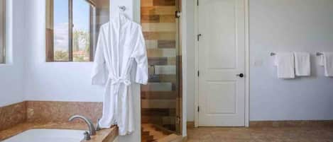 Shower, hair dryer, towels, soap