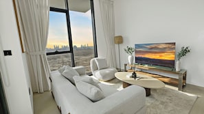 Luxury Apartment, 2 Bedrooms, Balcony, City View | Living area | Smart TV - Pure Voyage JVC (Dubai)