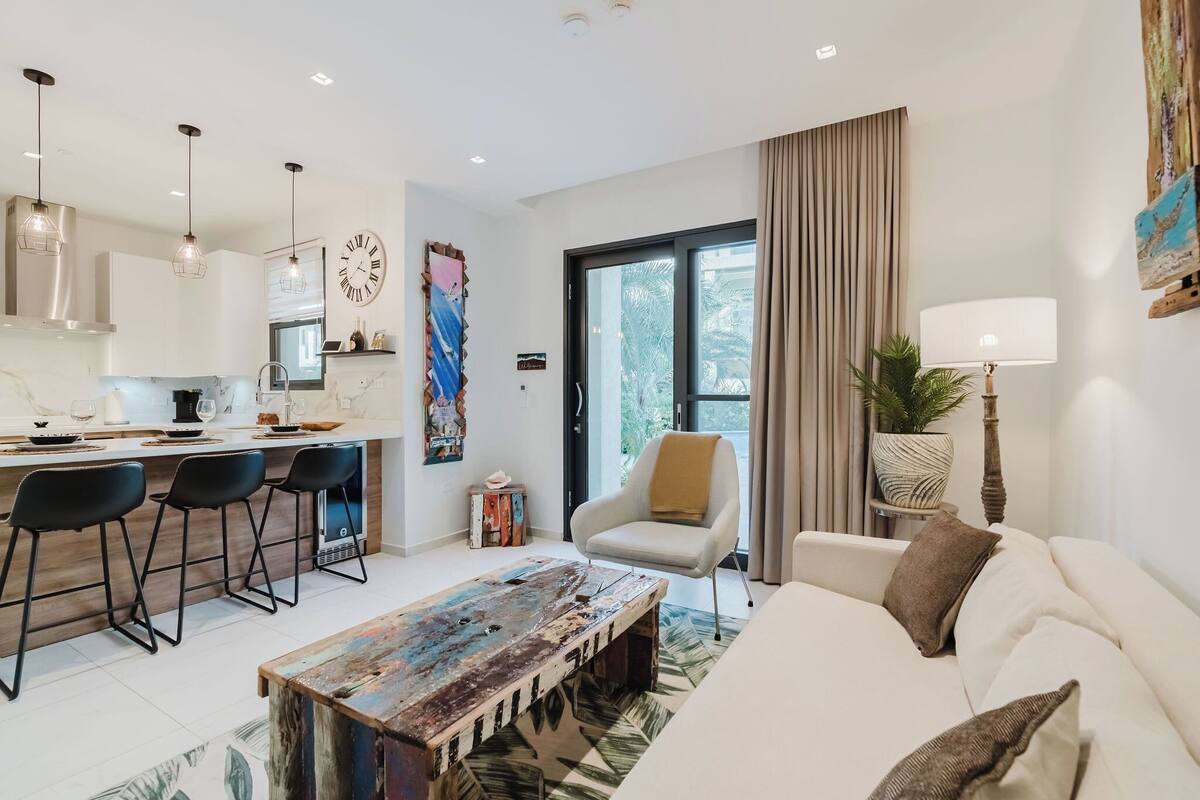 Deluxe Condo, 1 King Bed, Poolside | In-room safe, laptop workspace, blackout curtains, iron/ironing board