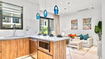 Family Condo, Balcony, Pool View | Private kitchen | Full-size fridge, microwave, oven, stovetop