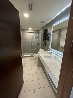 Hair dryer, towels, soap, shampoo