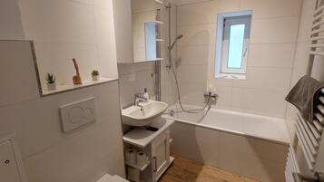 Hair dryer, towels, soap, toilet paper