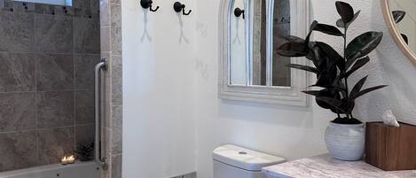 Jetted tub, hair dryer, towels, soap