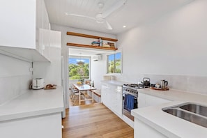 Fridge, microwave, oven, stovetop - Grey River Beach House - 10 minutes to Wye (Grey River)