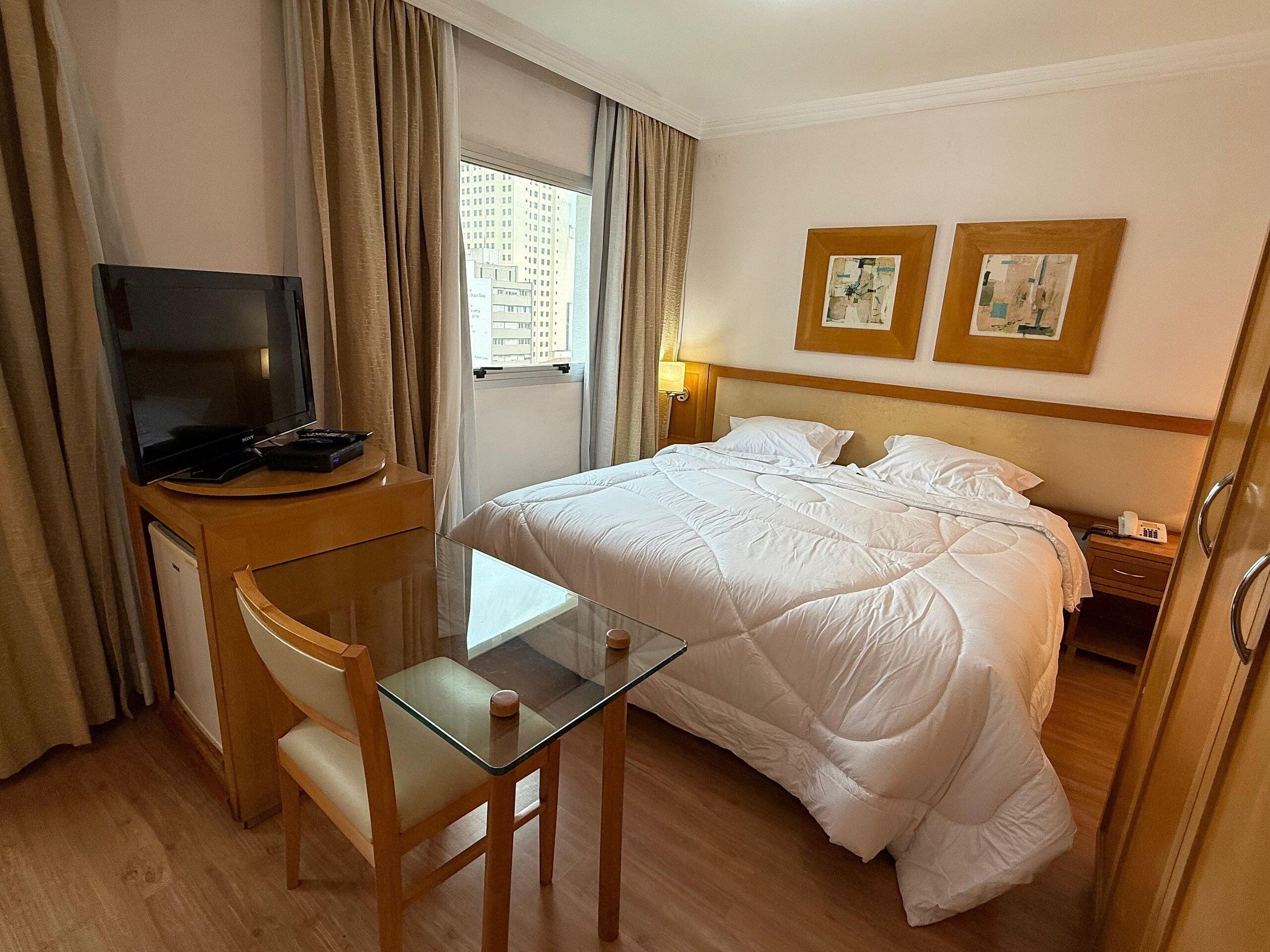 Apartamento | Cofres nos quartos, ferros/tábuas de passar roupa, Wi-Fi de cortesia