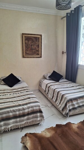 2 bedrooms, iron/ironing board, WiFi, bed sheets