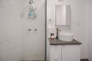 Hair dryer, towels, soap, shampoo