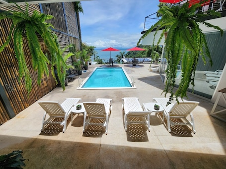 Suite 4 Pool Ocean View | Minibar, in-room safe, individually decorated, blackout drapes