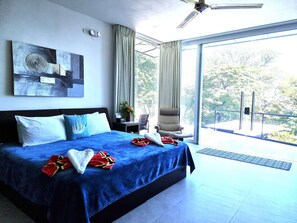 Suite 1 Ocean Jungle Pool | Minibar, in-room safe, individually decorated, blackout drapes